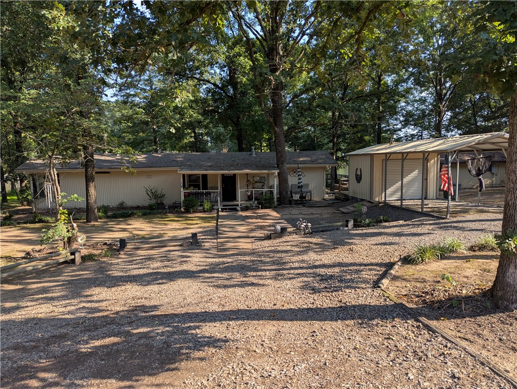 If you wanting to enjoy the lake life or have a weekend retreat to get away. This is it! move in ready extremely well maintained manufactured home, enclosed sunroom facing the water. Enjoy crappie fishing in one of the best coves in the lake. Level back yard small wood deck sidewalk to your boat dock. Detached carport with a storage room. Small lot so you don't have to spend time mowing the yard when you could be relaxing. Updated kitchen appliances maintained. MOVE IN READY! PLUS WITH OPTION TO PURCHASE FULLY FURNISHED. This is a private property so PLEASE DON'T TRESPASS YOUR REAL ESTATE AGENT MUST BE PRESENT.