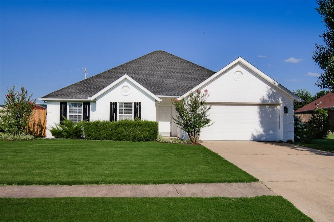 Take a look at this stunning 3 bedroom home located in the Valley View Subdivision! This home features gorgeous front landscaping and a spacious living room with a cozy fireplace that flows seamlessly into the kitchen and dining area. The kitchen offers an eat-in design, perfect for casual meals and gatherings. The master suite boasts a luxurious ensuite with a soaking tub and a large master closet. Step outside to a partially covered patio and a large backyard—ideal for relaxing or entertaining guests. Roof was replaced in 2022, AC motherboard replaced 2023, and water heater replaced 2023. Kitchen refrigerator, backyard shed, and window treatments all convey