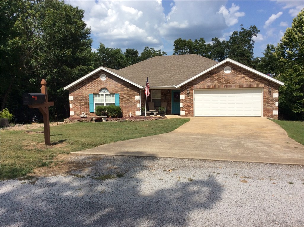 Updated home includes new appliances and new heat & air. Granite countertops. Private location and appr. 1.01 acres. Perfect home in a beautiful cul-de-sac setting. Fenced back yard. Split floorplan. High end security cameras. His & hers closets. Nice deck in back. Walking trails through their lots. Bentonville schools. This is a house you would be proud to call home. Home includes a total of 3 lots.
