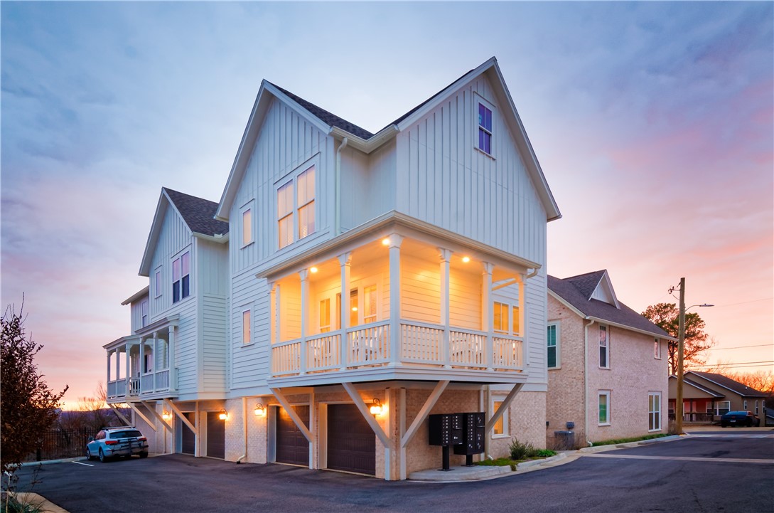 Vibrant & Fully Furnished 2BR/2BA Townhome ā Walk to U of A! Step into this over-the-top, light-filled 2-bedroom, 2-bath townhome that radiates energy, style, & modern comfort! Open-concept layout features a fun, upbeat atmosphere that's designed for those who love to entertain & enjoy effortless, care-free living! The spacious living area flows seamlessly into a sleek, fully equipped, quartz, stainless kitchen & dining area. The private wrap around balcony offers a perfect spot to relax & take in the fresh air & views of the hills to the east! Move-in ready, completely turn-key & fully furnishedājust bring your suitcase! Parking is a breeze w/a 2-car garage plus an additional 3rd parking space that conveys with the unit. Best of all, youāre just a short walk to the University of Arkansas, w/easy access to all athletic facilities, shops, & dining. Don't miss this rare opportunity to own a stylish, fully furnished, like new home in an unbeatable location. Be sure to check out the Virtual & Matterport tours!