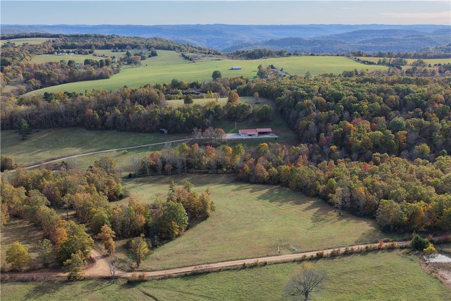 This 14-acre property in Compton sits in a prime location near Centerpoint, the Compton Trailhead to Hemmed-In Hollow, Hideout Hollow, and some of the best hiking and elk country in the Ozarks. It’s a beautiful piece of land with the quiet, tucked-away feel so many buyers look for in this part of Newton County.
The ground lays well with a great building site, plus a seasonal creek and a nice pond—an appealing combination of features that’s increasingly hard to find. The fencing is in excellent shape, and the acreage has been well maintained. The property sits roughly half a mile off Highway 43, offering convenient access without sacrificing privacy. As of 11/13/2025, Compton water taps are available here as well, which is a big plus for future building.
Whether you’re dreaming of a cabin, a small homestead, or a long-term investment, this tract checks the key boxes: good access, water features, wildlife, and proximity to the most sought-after areas of the Buffalo National River region.