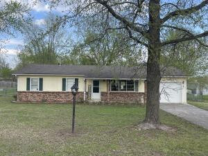 Come check out this beautiful remodeled home!! This 3 bedroom 2 bath home is the perfect starter home. This house has many amenities including a covered back deck, fire pit, heated and cooled 2 car detached garage, and an above ground pool!! This house sits on a beautiful .4 acre lot that is flat and perfect for entertaining. The living room, kitchen and breakfast nook are all open for a wide spacious feel. Come check this one out before its gone!!!