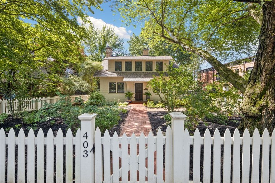 Your chance to own a piece of Fayettevilleās history has arrived. Step into timeless charm at 403 E Lafayette, a lovingly preserved historic home nestled in one of the cityās most sought-after neighborhoods. Every detail has been thoughtfully restored to honor the past while embracing modern comfort. The renovated kitchen, luxurious bathrooms, and all new windows blend classic style with fresh, high-end finishes, while the hardwood floors and restored fireplaces in the living room and upstairs bedroom, bring a warmth that only a historic home can. Outside, a white picket fence wraps the spacious corner lot in a picture-perfect frame, leading to a backyard oasis with flourishing gardens and a generous composite deck for evening gatherings with friends and neighbors. Fresh shaker-style siding adds crisp curb appeal, completing the perfect balance of history, beauty, and livability. Donāt miss this rare opportunityāhomes of this caliber and character in this location seldom come available.