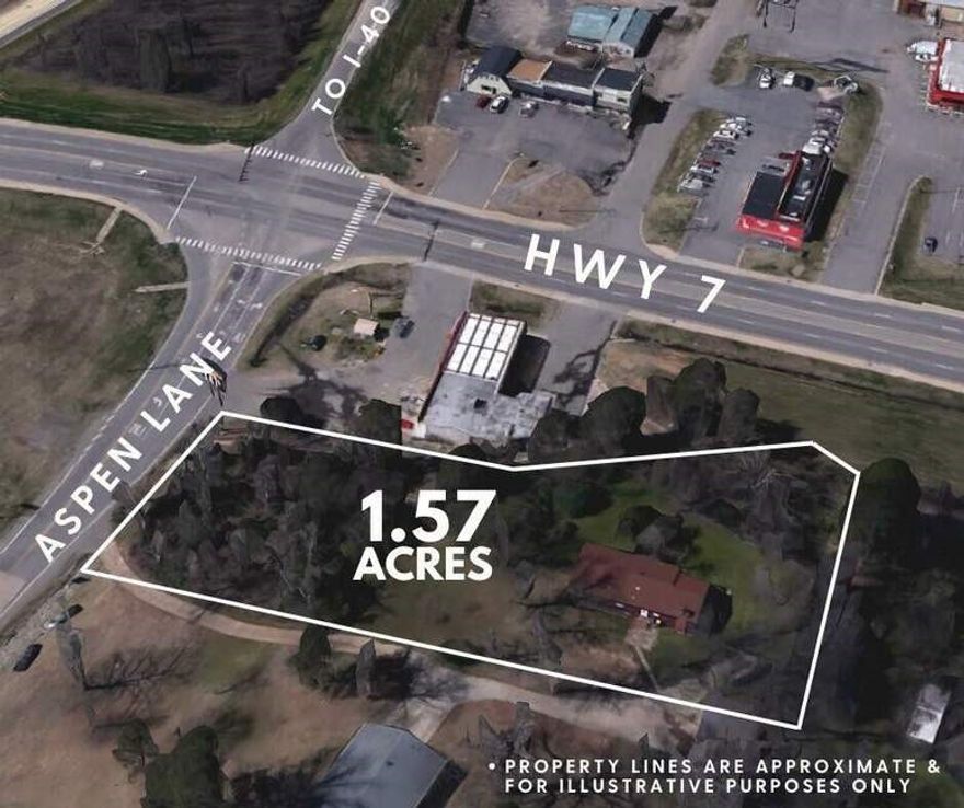 1.57ac commercial lot with I-40 & Hwy 7 visibility! Prime Russellville location near Arkansas Tech University (ATU), major retail, diverse dining, & hotels. Zoned commercial, offering endless development potential. High traffic area ensures maximum exposure. Ideal for restaurant, hotel, or retail. Capitalize on Russellville's thriving economy. Rare opportunity to own prime commercial real estate in Russellville, AR!