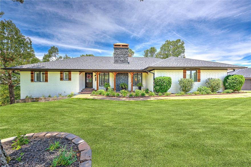 Ready for lake life? Look no further! This home has been completely remodeled and is move-in ready! Walk in to find a beautiful open floor plan complimented by vaulted ceilings with wood beam accents, new LVP flooring throughout, a wood burning fireplace and large windows that offer beautiful natural lighting. A full kitchen remodel in 2022 brings additional cabinet storage, ample counter space with black textured granite, bar seating, a black stainless steel single-basin kitchen sink, beverage mini fridge, and a brand new dishwasher. On the main floor you'll find the primary suite with stunning lake views as well as a guest bedroom and full bathroom. Downstairs offers a walk-out basement with large bonus room as well as another guest bedroom with full bath. Attached 2 1/2 car garage with an additional detached 3 car garage. In addition to the 180° year-round lake view, you're also 0.6 miles from Coppermine Boat Launch and 3.8 miles to Rocky Branch Marina! Full remodel/upgrade list in supplements.