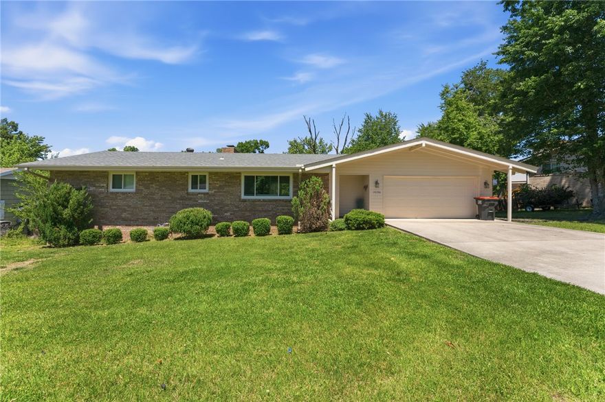 This beautifully updated 2-bed, 2-bath ranch offers comfort, style, and an unbeatable location just minutes from Beaver Lake and Prairie Creek Marina. The light-filled living room features modern finishes and a decorative fireplace, creating a warm, welcoming space. The functional kitchen offers ample cabinetry, updated fixtures, and room to cook and gather. Both bedrooms are generously sized, and the refreshed bathrooms provide clean, contemporary appeal. Outside, enjoy a large backyard and expansive deck—perfect for relaxing, entertaining, or taking in quiet mornings. With a 4-year-old roof plus new windows installed last year, this move-in-ready home works as a full-time residence, weekend lake retreat, or smart investment. Storage area underneath the home for a small workshop or for lawn equipment.