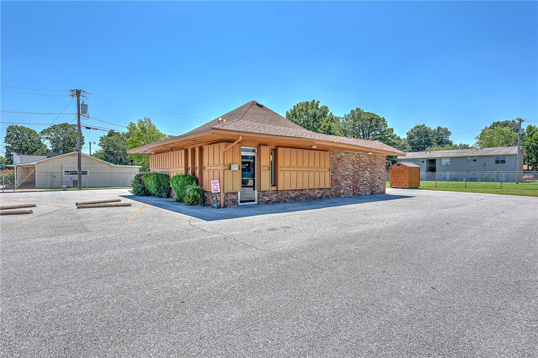 Attention investors and entrepreneurs! This 1,200 SF building is ideal for medical, office or retail and is located 1.4 miles off I-49 on Huntsville Avenue (23,00 daily traffic count). Excellent visibility (131 feet of road frontage), lots of parking and, at .45 acres, plenty of room to expand. The interior is super clean and was completely updated in February. The property is tenant-occupied and features a NNN lease in place with a base rent of $20.81 PSF, through September 30, 2025. Zoned C-1. Property was originally built as a restaurant and has a grease trap in the rear of the building.