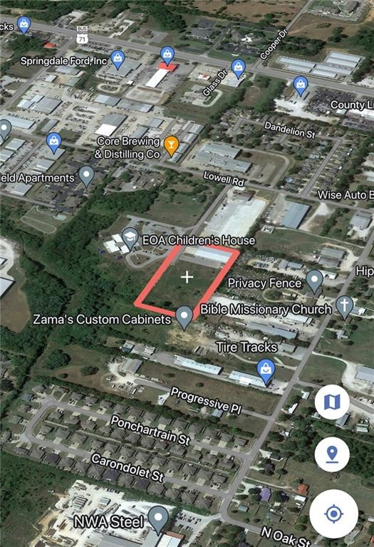 Approximately 3.5 + or - acres close to Highway 71 and Wagon Wheel Road to I49. Surrounded by industrial and commercial businesses and schools. City approved plans for three or more commercial warehouse/store front spaces. Subject to lot split. City utilities.