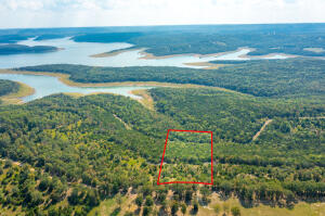 Lake View! Short drive to 125 Marina. Great building site. South line joins U.S. Army Corp. of Engineers.