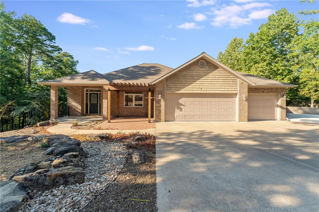 Tucked away on 1.27 acres across 3 private lots, this 3,660 SF contemporary home offers space, flexibility, and privacy. A wide 8-ft concrete driveway leads to a 3-car garage plus parking pad. Inside, enjoy oversized rooms, big windows, custom built-ins, and a handicap-accessible layout. The main level features a spacious primary suite with a large bath and closet, utility room with sink, dining area, and half bath. The custom deck was completely redone and is now fully screened-in—perfect for relaxing or entertaining. The lower level offers a second living area, 2 additional bedrooms, 2 office/study/bonus rooms, full and half bath, and dual access to the patio. Poured concrete foundation, HP with propane backup, and 2020 roof complete the package. Outside you will also find a storage building for extra storage.