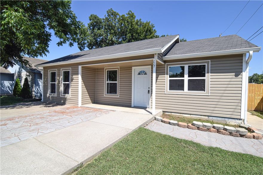 Newly renovated 4 bed/2 bath home minutes from downtown Rogers, seconds from Veterans Park, right off bike trails, couldn't ask for a better location. This home has 2 living areas, eat-in kitchen and a possible 4th bedroom/office. New flooring, paint, cabinets, bathrooms, windows, siding. Must see in person to appreciate.