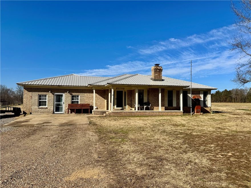 Space to spread out, room to breathe, and just minutes from town! This 2,400 SF home sits on two acres just outside the Atkins city limits, offering the perfect blend of country freedom and everyday convenience. Inside, you’ll love the flexibility of two spacious living areas, one featuring a charming rock, wood-burning fireplace perfect for cozy nights and gatherings, along with a large kitchen ideal for cooking and entertaining with loads of cabinets, generous counter space, and an oversized laundry room and pantry. A spacious flex room easily adapts as a home office, hobby space, playroom, or guest room, while all three bedrooms are generously sized for comfortable retreats. Major updates are already complete with a metal roof just one year old and an HVAC system approximately five years old. Outside, enjoy ample parking, room to roam, and a storm shelter, all just minutes from town and schools—offering the best of both worlds in space, comfort, and convenience.