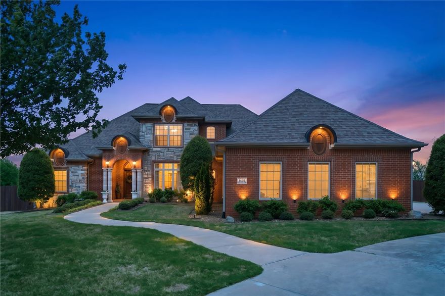 Where Everyday Living Feels Like a private Retreat in the heart of NW Arkansas! Exquisitely reimagined & impeccably upgraded, this remarkable residence blends timeless elegance with modern luxury. A stunning 2024 addition introduces a light-filled living space with vaulted ceilings, exposed beams, & a dramatic floor-to-ceiling limestone fireplace. The designer kitchen is appointed with quartzite countertops, premium Thermador & KitchenAid appliances, & a steam oven—crafted for both refined entertaining & everyday indulgence. Additional highlights include a bespoke study with custom built-ins, a beautifully redesigned laundry room with integrated pet kennel, renovated baths, & new high end flooring, & lighting throughout. Outdoors, a private resort-style sanctuary awaits with a saltwater pool, hot tub, outdoor kitchen, multiple lounging areas, & irrigated raised box gardens. Enhanced by all major system upgrades and meticulously manicured grounds, this home offers an exceptional lifestyle of comfort and distinction.