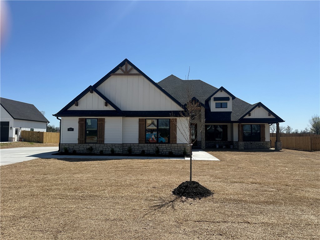 Welcome to the Kenley Plan, a beautifully designed home nestled in the highly sought-after Jenna Estates community in Gravette, Arkansas. Situated on a generous 1.03-acre lot, this thoughtfully crafted home offers the perfect blend of space and functionality.Boasting 4 spacious bedrooms, 3.5 baths, an office, & a bonus room, the Kenley Plan is built to accommodate your lifestyleāwhether youāre working from home, or simply enjoying family time.Step inside to find vaulted ceilings & quartz countertops that elevate the homeās modern charm. The open-concept kitchen features premium finishes & a pot filler, perfect for the home chef. The expansive layout continues into large, light-filled bedrooms & stylish bathrooms with high-end touches.A 3-car garage provides plenty of room for vehicles, storage, or a workshop space, while the wide-open backyard offers endless possibilitiesāfrom gardening to entertaining under the Arkansas sky.Donāt miss your chance to own this dream home in one of Gravetteās premier neighborhoods.