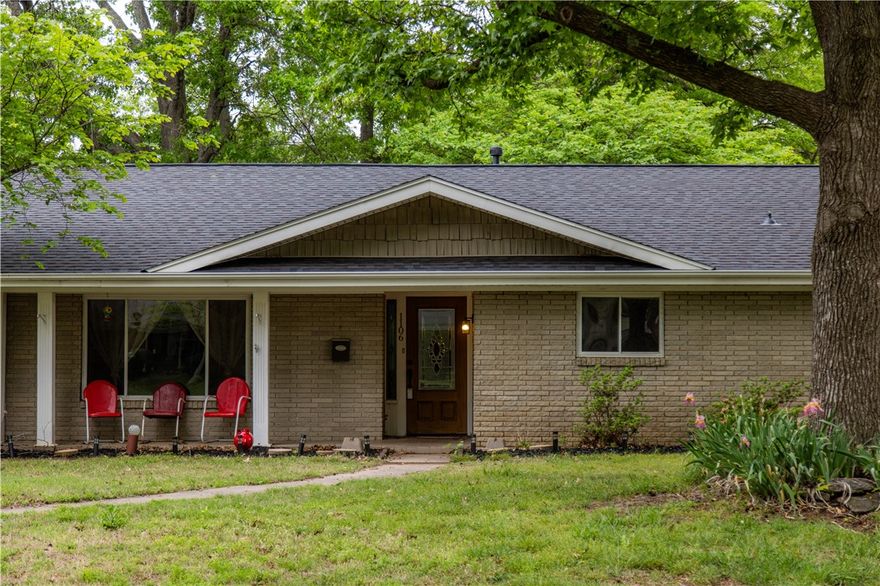 Welcome to a charming ranch-style home nestled on over three-fourths of an acre. This spacious one-level home features 4 bedrooms, 3 bathrooms, and more than 3,200 square feet of living space. Large rooms and multiple living areas create an ideal setting for both everyday living and entertaining, while the 400 sq. ft. sunroom and backyard provide an inviting space for the whole family to enjoy. The kitchen, primary bathroom, and utility room feature custom maple cabinetry and granite countertops. Extensive renovations completed in 2005–2006 blend vintage charm with modern updates, offering the perfect canvas to add your own personal style. Recent improvements include a brand new roof, new hot water heater, dishwasher, fireplace and chimney improvements, updated bathroom fixtures, and new carpet. Set among mature trees in an established neighborhood and located in close proximity to I-49, JB Hunt Park, and Downtown Springdale, this home presents an ideal blend of space and convenience.