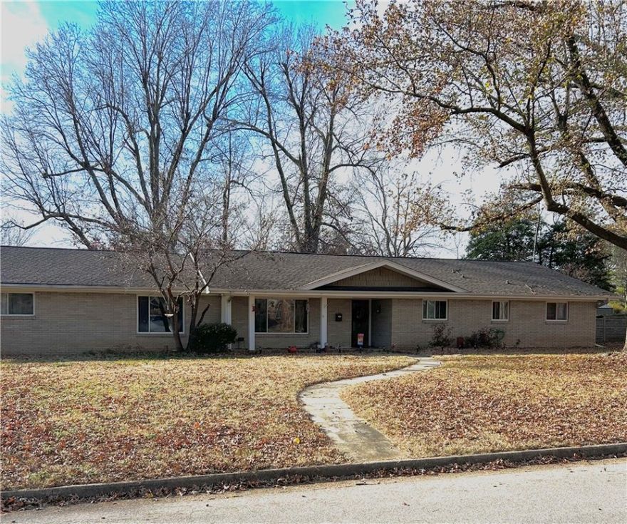 A charming 1965 ranch-style home nestled on over half an acre. This spacious home features 4 bed, 3 bath, and 3,274 sq. ft. of living space. Additionally, an extra living area and sunroom offers space for the whole family to enjoy. Opportunity to add your own style and updates throughout the home.