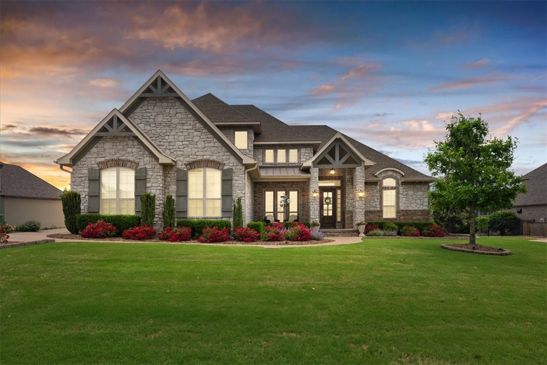 Discover this stunning home nestled in the highly sought-after Otter Creek community. Situated on a spacious half-acre lot, this residence offers five bedrooms, three and a half baths, a formal dining area, a dedicated office, and a versatile bonus room—perfect for family living and entertaining.
Relax and entertain on the large, covered, screened-in back porch, featuring a cozy fireplace. The backyard oasis includes an in-ground pool, all surrounded by privacy trees for a tranquil retreat. This exceptional property combines luxury, comfort, and outdoor enjoyment in a sought-after neighborhood.
The open floor plan is bathed in natural light, thanks to an abundance of windows that showcase beautiful views throughout the home. Inside, you'll find a sophisticated color palette complemented by gorgeous hardwood floors and granite countertops, creating a perfect home.
