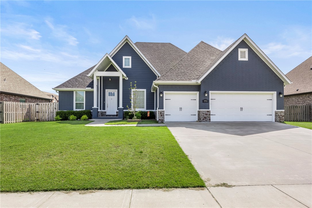 Stunning home features 3512 square feet, 5 bedrooms, 4 bathrooms, 3 car garage, bonus room, 2 living areas, plus formal dining room. Agent Owned. Eat-in kitchen w/ farmhouse stainless sink, shaker style cabinets, granite countertops, tile back splash, microwave, built-in oven, countertop gas cooktop, & pantry. Living room w/ gas log fireplace including stone accent & custom made mantle. Primary suite features double sink w/ full mirror, jacuzzi tub, tiled / walk-in shower w/ glass door, oversized walk-in closet, & private patio area. Home features; 3 cm granite, custom cabinets, crown molding, vinyl low E windows, brick maintenance free exterior, flat yard, & keyless entry. New Roof and exterior paint 2025. Perfect home for entertaining!