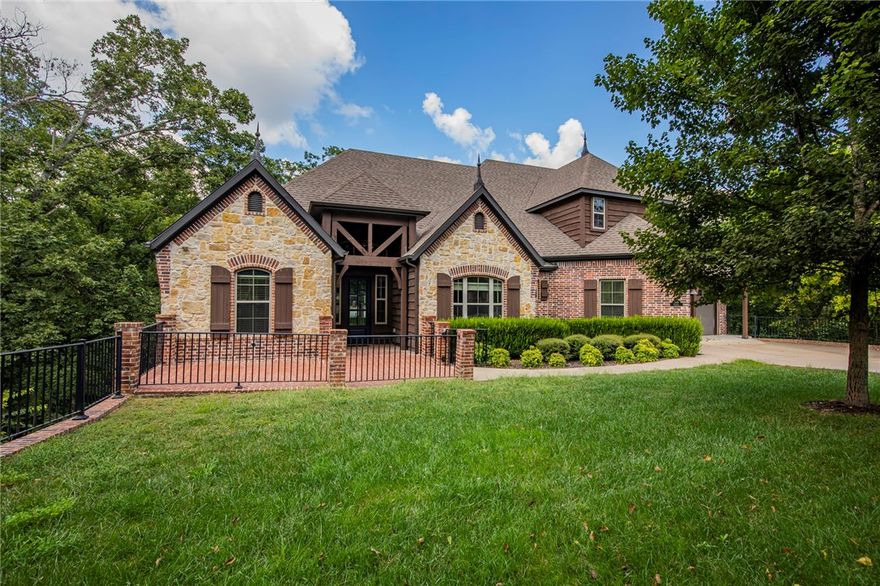 This big beautiful Bentonville home is hidden on a dead end a cul-de-sac street surrounded by tall trees on a .75 acre lot.  The backyard overlooks dense woods and includes a firepit and two different back decks to choose from.  All of this privacy and space, but only 3 min drive to I-49.  The neighborhood is right across the street from the North Bentonville Trail (Walking/Biking Trail) and Bark Park.  This home, with no shortage of space, has 5 bedrooms, 4 baths, a formal dining room, 2nd living room with a wet bar, bonus room, tons of extra storage, and a flex space that can be used as a gym/media room.