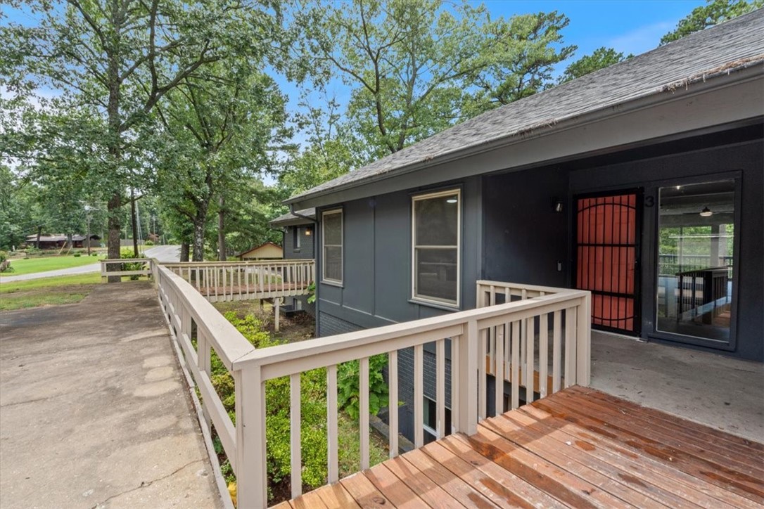 Preferred lender offering up to $2,000 in credits for qualified buyers! This beautifully renovated 3-bedroom, 2-bath townhome with oversized bonus room is just minutes from Bella Vista Country Club, Tanyard Creek, Lake Avalon, and Lake Windsor. Enjoy access to world-class mountain biking, golf courses, lakes, and nature trails included in Bella Vista POA. With over $45K in upgrades, this home features granite countertops, updated finishes, and a functional layout with upper and lower living areas. The main level offers a bright, open living space, modern kitchen, and primary bedroom with ensuite bath, while the lower level includes a spacious bonus room, two bedrooms, and a full bath. Relax on the upper and lower decks overlooking a peaceful wooded setting. Roof replaced less than 4 years ago. Includes 2 parking spaces, dual entrances, and full Bella Vista POA access. Perfect as a primary residence, investment, or short/long-term rental.