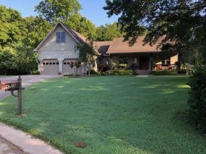 Beautiful custom home in one of Harrison's most desired neighborhoods, this home features an open-concept floor plan with 9' ceilings, a recently remodeled master bath, split 3 BDR on the main floor; a large bonus room over the garage with attic access for extra storage, a hobby room, and 3/4 bath. The garage is over sized. Enjoy quiet cul-de-sac privacy and a 1.07 acre park-like beautifully landscaped yard with a greenhouse and garden area.