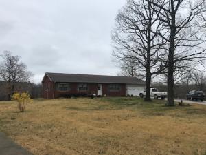 Beautiful view of RoundTop Mountain, Jasper, and surrounding mountains from this 4 bedroom, 3 bath brick home on 20 acres. Only 2 miles from Jasper and 1/4 mile off Hwy 7. Roof is 3 years old. Full, semi-finished basement with large area for rec room, den, or storage. Large living room, new hot water heater. Could have 5 bedrooms or office or craft room.