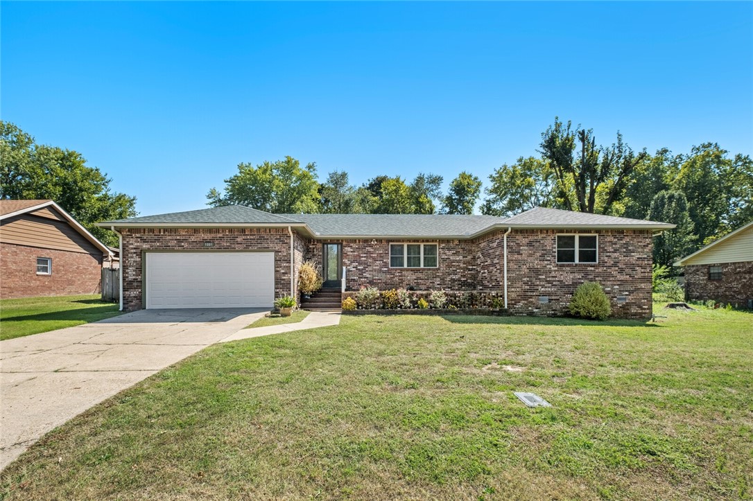 Beautiful brick home in the Heart of Berryville! This charming, meticulously maintained 3 bedroom home is snuggled into a cozy, manicured neighborhood with centralized access to all of Berryville. Whether it be the Historic City Square, Carroll Country Club & Golf, Shopping (major new retailer announced for 2025) or the Outdoor Recreation for which the Ozarks are most famous (by way of the robust Kings River), its all within a 2 mile radius! Berryville is a lovely and charming community known for its traditional, resourceful and friendly culture. And hey, if you want to keep it weird for a weekend.. Eureka Springs is less than 15 minutes away! This home has a new roof, new AC unit, new windows throughout! Front foyer and Parlor room, open Kitchen which looks into the Living Room with a custom, brick Fireplace. Double doors leading to a fresh back porch, a huge backyard and a shingled-roof shed for storage, hobbies or kids' clubhouse! Open House on Sunday 8/30! Neighborhood even has buried power lines!