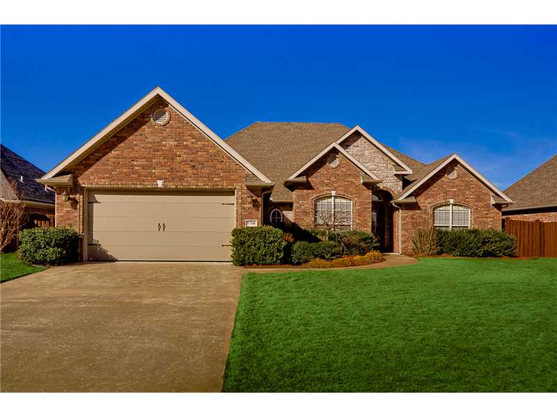 BEAUTIFUL 4 BEDROOM, 2.5 BATH HOME IN CONVENIENT ROGERS LOCATION. FEATURES INCLUDED LIVING ROOM & KITCHEN W/2 SIDED FIREPLACE, FORMAL DINING, STUNNING KITCHEN W/BUTCHER BLOCK-TOP ISLAND & BREAKFAST NOOK, HUGE UTILITY. MASTER SUITE IS COMPLETE W/FIREPLACE,IN PRIVATE SITTING AREA, BUILT-INS, & SPA-LIKE MASTER BATH. HOME ALSO INCLUDES WOOD FLOORS, CROWN MOLDING, GORGEOUS CABINETS & MORE. PRIVACY FENCED YARD IS THE PERFECT PLACE TO RELAX W/IN-GROUND POOL & COVERED PATIO AND EXTRA COVERING BY ELECTRIC AWNING.