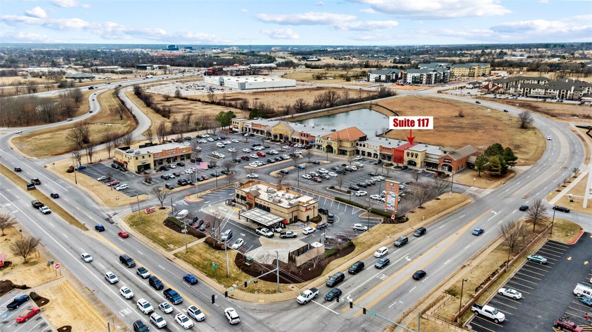 Discover the potential in this +/- 1,845 SF space at Tuscany Square in Rogers! The layout includes a spacious open area, a versatile room suitable for an office or storage, and a private restroom. Ideal location and convenient access: Tuscany Square is home to popular tenants like Starbucks and Chick-fil-A, ensuring high foot traffic, and is located off Pleasant Grove Rd with easy access to I-49. Ample parking for both customers and employees. NNN lease, tenant pays their own gas/electric bill and a $187 fee monthly for trash and water. This prime space won't last long. Explore the possibilities and secure your spot at Tuscany Square!