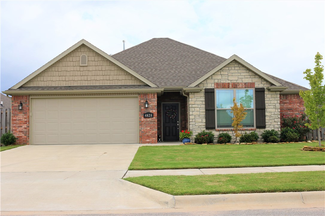 This house was built in 2017 and looks just like the day it was finished. It features wood floors in the living and bedrooms, granite counter tops, full privacy fence, tile shower in the master bathroom, walk in closets, screened in covered patio, sprinkler system, upgraded landscaping in the font and back yard, a fantastic kitchen with a huge corner panty and gas range, crown molding, vaulted ceiling in the front bedroom and a tray ceiling in the master. This home is a must see!!