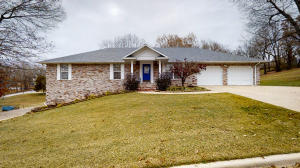 Beautiful 4 bedroom house in a secure neighborhood with tons of storage. Open floor plan, all brick with screened sunroom. Huge craft room on main floor. New roof and HVAC installed in 2015. Just what you are looking for!