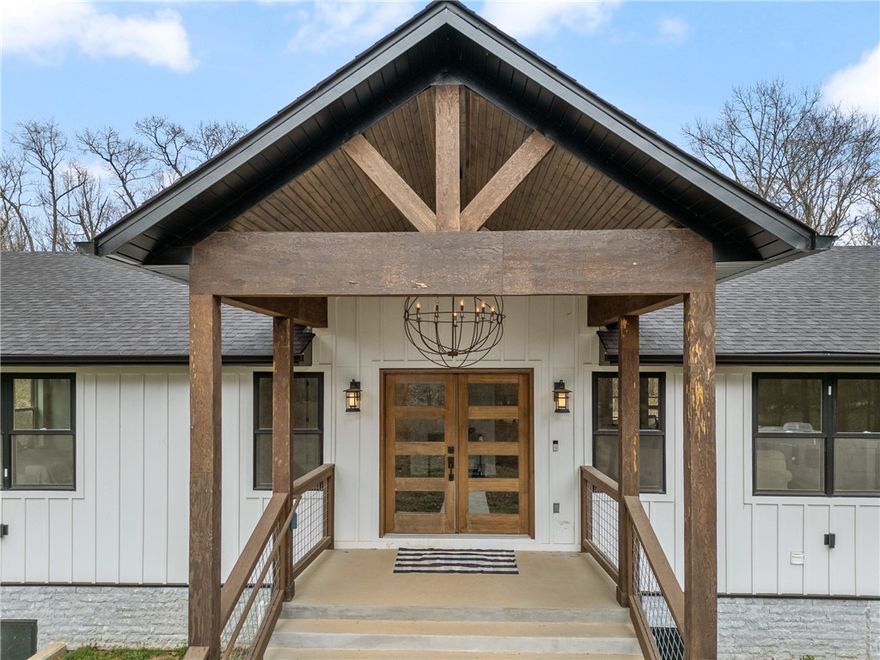 Welcome home to the fully remodeled home in the heart of Centerton. This home offers plenty of room to spread out over 5 acres while being right in town. Everything in the home is new and has been updated at the time of remodel to include wiring, plumbing, HVAC, new buried propane tank, new septic system and connected to city water! With 4 beds and 3.5 baths, giant bonus room downstairs there is plenty of room for the whole family! Step into the massive primary suite that includes washer and dryer in the closet with plenty of hanging space for all of your clothes or take a soak in the claw foot free standing bath tub! Master is located on the main floor and all guest rooms are located down stairs which also features a laundry room as well!