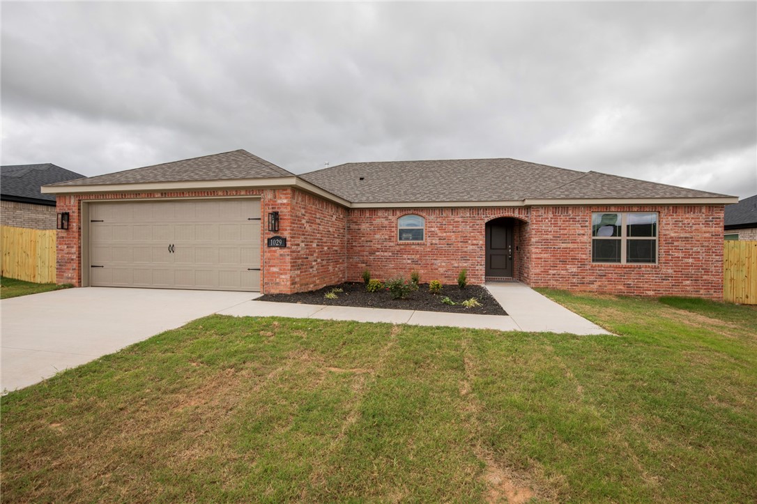 Beautiful new construction home on the east side of Lowell. Split floor plan. The main living area has wood style tile flooring and carpet in bedrooms. Gas fire place in living room. Lots of natural light. Kitchen features stainless appliances and nice pantry. Master has tile shower and large walk in closet. Fenced yard.