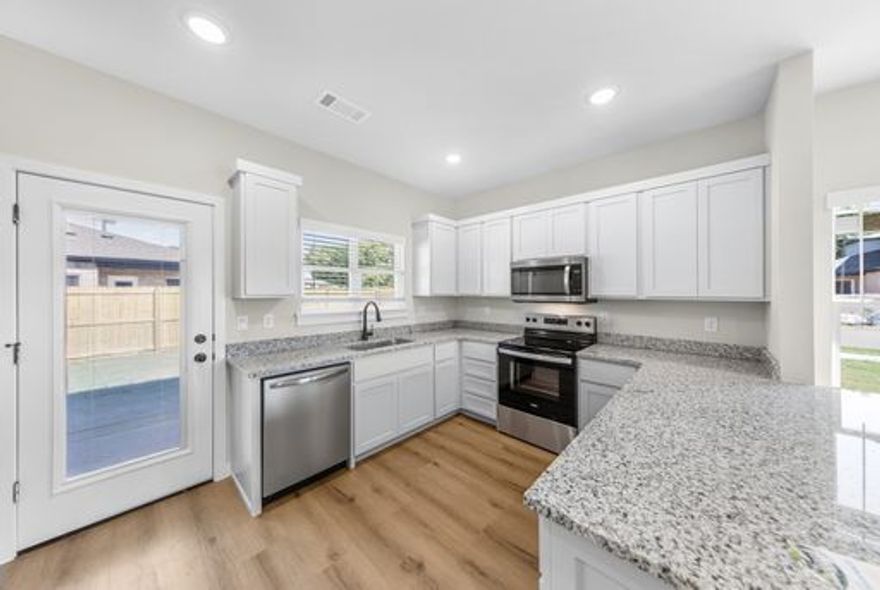 Brand New 3 Bedroom 2 1/2 Bath Duplex With 2 Car Garage.