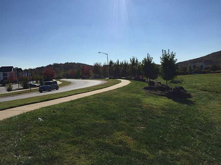 Great Commercial Potential near the University of Arkansas, and I49 Interstate.  Commercial Property is adjoined with 10.93 Acres West and is being sold together. Restrictions apply to multi-family construction, see agent. Great location near University of Arkansas perfect for Retail.