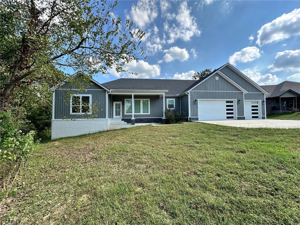 Spacious single level home featuring 4 bedrooms, 3 full baths, and a 3-car garage. Kitchen has tiled backsplash, stainless steel appliances, 2 cm quartz countertops and cabinets for days! Luxury Vinyl Plank, ceramic tile, and carpeted bedrooms. Sitting on nearly half an acre, this home offers room to relax, entertain, and enjoy the outdoors. Close to bike trails, golf, shopping, and the lake and just ~25 minutes from Walmart Home Office.
Owner is related to a realtor. Owner is related to the builder. Builder is a licensed real estate agent with Crye-Leike Realtors of Siloam Springs.