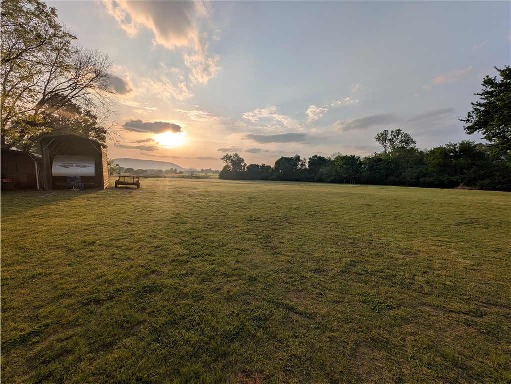 Land 10 +/- acres:
Beautifully situated between the Ozark and Ouachita Mountains, this 10+/- acre parcel of open, partially fenced land features a tranquil pond and offers endless potential for livestock, recreation, or future development. Whether you're looking to build, farm, or simply enjoy a peaceful retreat, this land delivers natural beauty and space to grow—just 15 minutes from Mt. Magazine and minutes from Paris High School and downtown amenities. Other Listings associated with this property include MLS #'s 1305082, 1321295, 1321348.