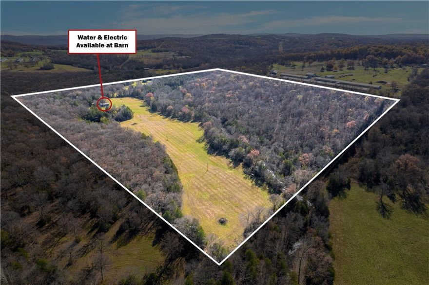 Discover the perfect blend of nature and convenience with this stunning +/- 80-acre property with a mix of mostly wooded and partial open fields. This property features a barn (approx. 50'x80') with electricity, two spring fed ponds and two wells. Kroger Branch Creek flows through the property. Electricity and municipal water is on site, natural gas is adjacent to the road. The pastures have been fertile and supported row cropping and later cattle at 1.5 u/acre in the past. There is remnants of a 200 year old homesite on the property with an impressive hand-cut stone fireplace that still remains. Build a dream estate or multiple. Per Washington county, the land could be split if the checklist items for the new subdivision are met. An ideal setting to build your dream home, start a farm, or simply enjoy peaceful, rural living just outside city limits. This land is ready for your vision. Don't miss this opportunity to own a private retreat with endless possibilities. The property also has abundant wildlife.
