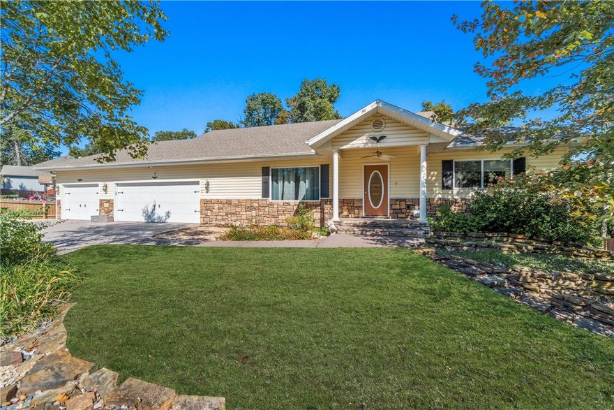 This stunning 4-bedroom, 3-bath home offers over 3,000 sq. ft. of thoughtfully designed living space on two lots totaling 0.78 acres. Car enthusiasts and hobbyists will love the 6 garage spaces—an oversized 3-car on the main level plus a 3-car tandem garage below with workshop area, floor drains, and true RV parking behind a privacy fence. The lower level also features a private 1-bedroom apartment with its own entrance, perfect for guests, in-laws, or extra income. Quality-built with 2x6 framing, two 1,000-gallon septic tanks, real hardwood floors, and double-hung windows. Fresh interior paint, updated lighting, and refreshed kitchen and bath cabinets give this home a modern touch. The primary suite boasts an oversized jacuzzi tub, and the converted 4th bedroom adds flexibility. Enjoy the 20x18 deck built to support a hot tub or cool off in the above-ground pool—this home truly has it all!