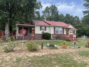 Adorable home in a rural Ozark setting! This home sits on 1.63 acres, is fenced, and boast a 40 x 40 shop w/electric. There are still original hardwood floors in some parts of the home. This one owner home has been well cared for throughout the years. There was a nice addition of a second bath, walk-in closet, and storage space to the master bedroom to give some extra living space! If you're looking for some great views and country living, be sure to come and see this home!