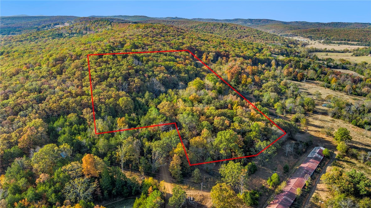Just in time for hunting season! Get lost in the trees and find solace in nature, off the beaten path on a beautifully rolling parcel. This untouched acreage is ideal for outdoor recreation of all kindsā camping, star-gazing, hunting, peeping wildlife. And enjoy those chilly firepit nights now, as well as a fun summertime swimming hole in nearby War Eagle Creek. Or maybe build your forever home, weekend retreat, or rental cabin right here, free of restrictions! The property features gently rolling to sloping, wooded views with frontage along both sides of a nicely-maintained county road, plus quick access to Hwy 23-S. From the highway, youāre in Huntsville in under 10 minutes to find restaurants, retail, and other local amenities. Range further afield to the Buffalo National River, Eureka Springs, the Kings, the Mulberry, White Rock, and plenty of other scenic spots for fresh air and fun. The good life awaits right here in the Natural State!