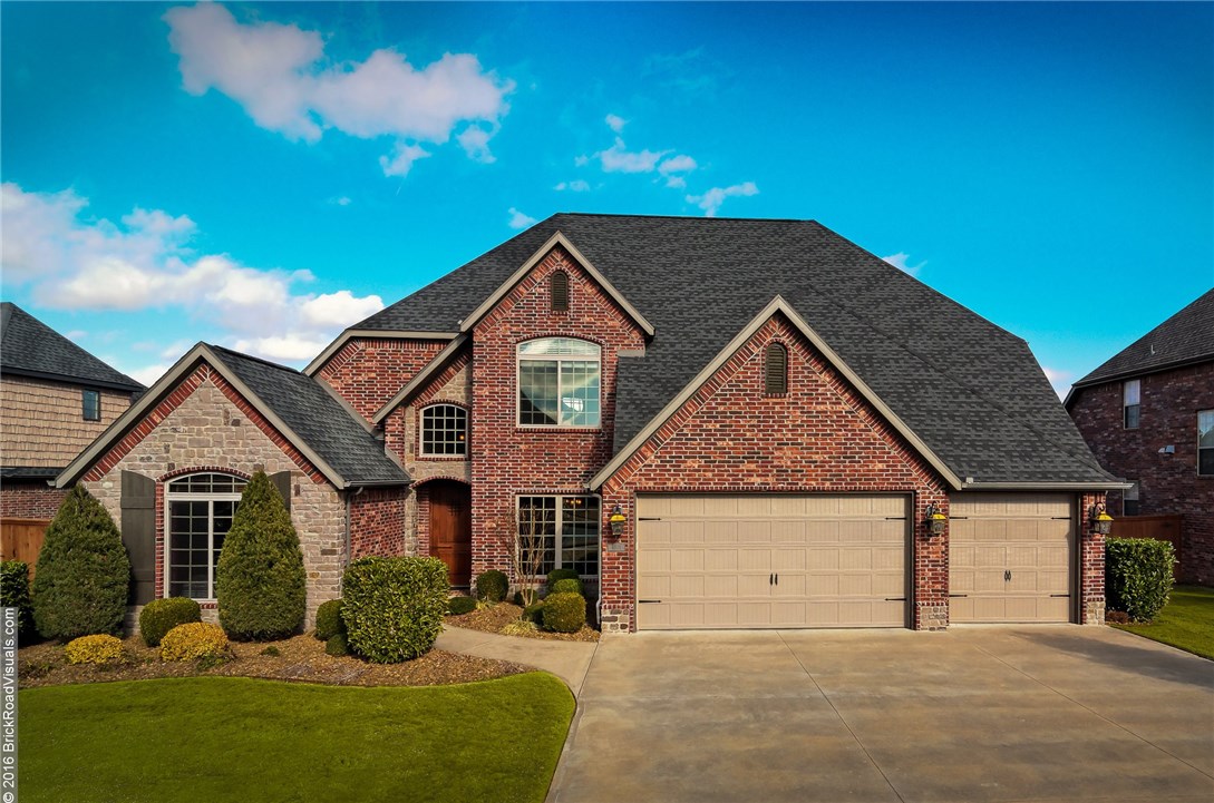 This Payne Construction masterpiece has all the bells and whistles, plus all the perks of living in Lochmoor Club! Intricate details like crown molding & woodwork highlight vaulted ceiling & gas fireplace in living room, & panels in dining room. Kitchen features built-in buffet & china display, plus granite tops, stainless appliances, pantry, & huge island with seating. Incredible master bath w/ tile walk in shower & spa tub. Bonus upstairs with wet bar. Covered patio out back with fire pit & grill. Three car garage with in ground storm shelter. Additional features include whole home sound, laundry cubbies, and custom coat station. 90 inch projection screen, surround sound and equipment to stay.