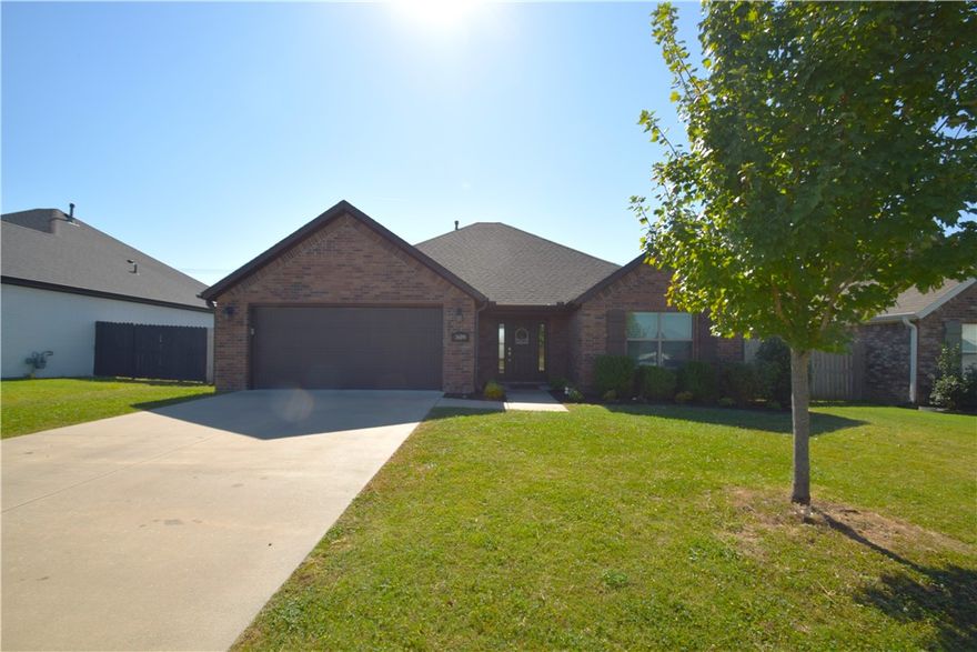 Welcome to the highly sought-after Cornerstone Subdivision! This fantastic 3-bedroom, 2-bath home features wood floors, granite countertops, stainless steel appliances, and a gas range. The kitchen includes a convenient pantry and vented hood. The open living space combined with a split bedroom floor plan provides comfort and privacy. Home comes with washer, dryer, and refrigerator. Step outside to a large, private fenced backyard with extra patio space. The new Walmart Home Office and downtown Bentonville are only 5.5 miles away, and you're close to the Bentonville Community Center and 35-acre Creekside Park. Also Enjoy Cornerstone's subdivision amenities: a clubhouse, pool, playground, and trail system with exercise stations. Pets are negotiable with owner approval and an additional deposit, no smoking, and a one-year lease is required.