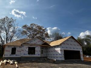 UNDER CONSTRUCTION!! HURRY! A buyer can get in early on this one and select some of their own colors and finishes! Quality throughout this 4 bedroom, 2 bath brick and siding home. Beautiful, spacious kitchen and dining with quartz countertops and walk-in pantry.Large open living room is the central focus of the home with large windows with a view to the outside covered area. Split floor plan, beautiful custom finishes throughout. Master bath features double vanity, separate shower and jetted garden tub, two walk-in closets, private toilet and linen closet. Hall bath is well-designed to accommodate 3 bedrooms with door separating tub/toilet and vanity area. Call about it today!