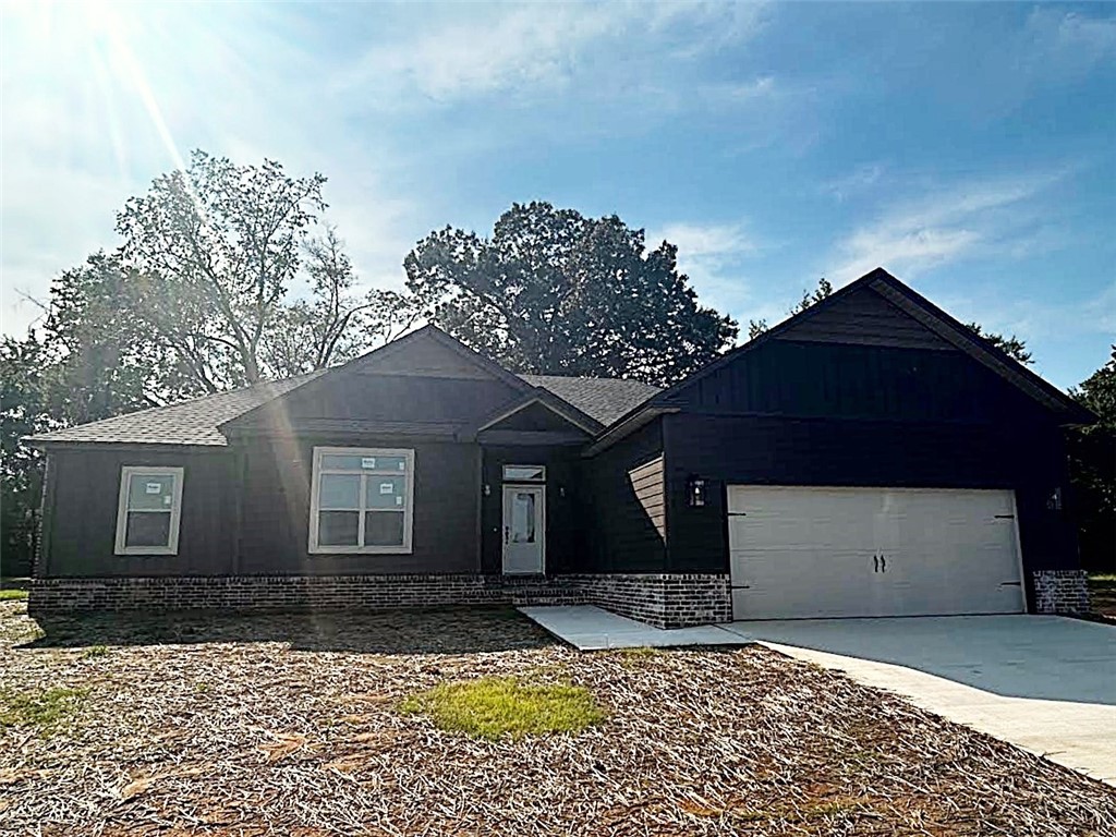 NEAR COMPLETION--MOVE-IN READY BY THE TIME YOU GET YOUR LOAN APPROVED! Quality throughout this 4 bedroom, 2 bath brick and siding home. Beautiful, spacious kitchen and dining with quartz countertops and walk-in pantry. Large open living room is the central focus of the home with large windows with a view to the outside covered area. Split floor plan, beautiful custom finishes throughout. Master bath features double vanity, separate shower and jetted garden tub, two walk-in closets, private toilet and linen closet. Hall bath is well-designed to accommodate 3 bedrooms with door separating tub/toilet and vanity area. Call about it today!