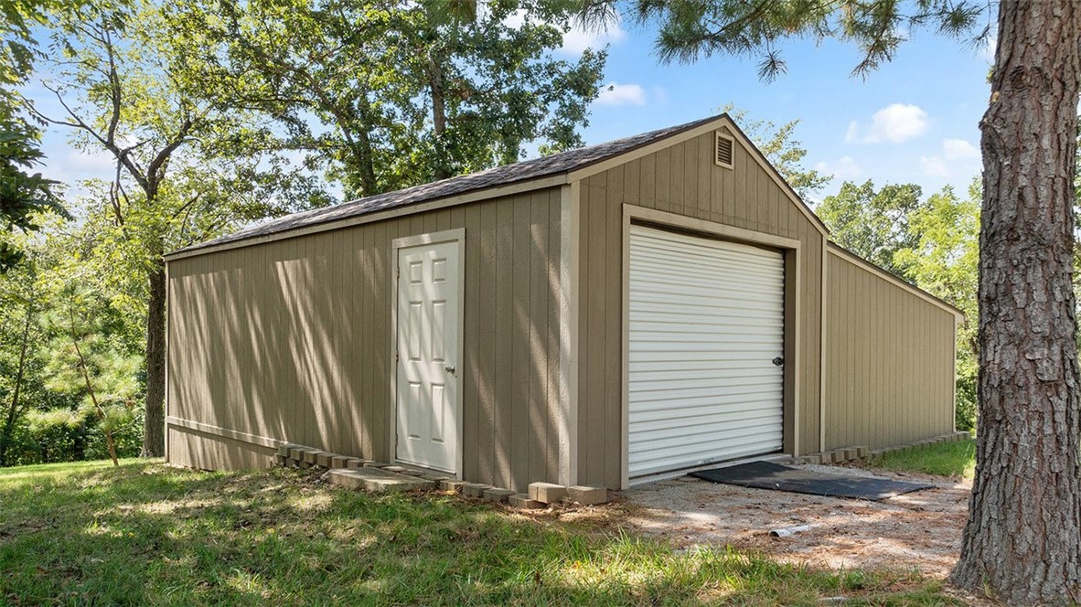 Lot is clear and has 775 SF Storage building with overhead door. Located minuets from Lake Loch Lomond. Approved borrowers will receive a closing cost credit of 1% of the loan amount up to $5,000 on their Closing Disclosure on their loan closing with Envoy Mortgage Branch NMLS #2659248 and Branch NMLS #2579798