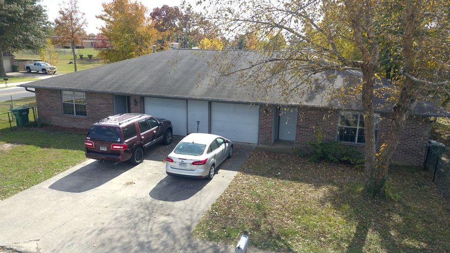 Very nice 2 bed/2 bath brick duplex centrally located in Rogers. Each side has a 1 car garage and newly built back deck. Both sides are currently rented with month-to-month leases. Great investment opportunity or live in one side and collect rent from other side to help make your monthly payment.