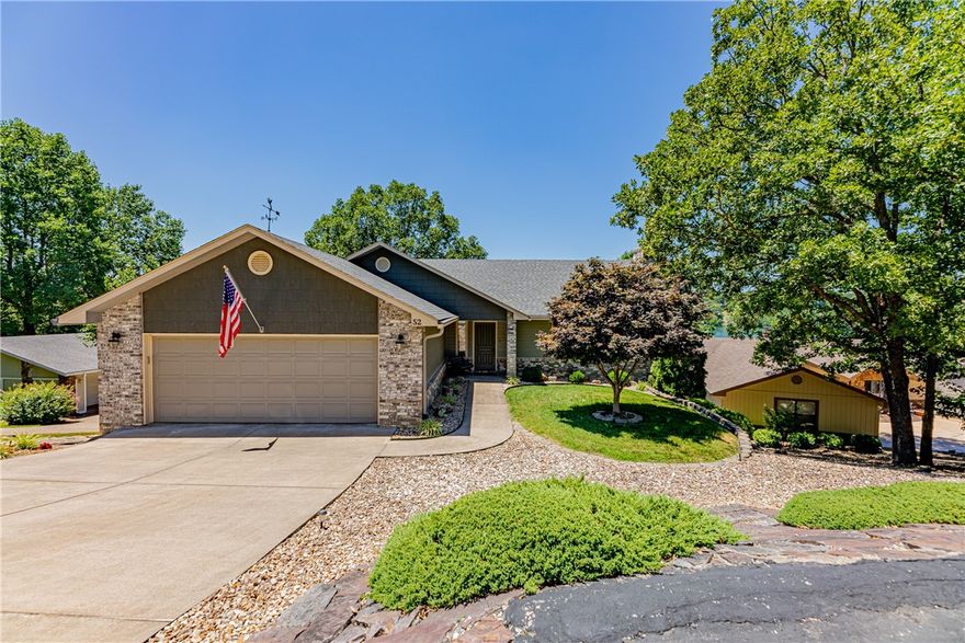 Stunning views of Lake Windsor from almost every room in this home. This home has been meticulously cared for. Recently painted exterior and new roof, professionally landscaped yard. Open Kitchen, great for entertaining. 2 Living areas. Gas fireplace's heat ducted through the home. 2 Master suites, one on the upper level and one on the lower, both have updated baths.  The upper master bath has heated floors, soaking tub and walk in shower. 22X12 enclosed sunroom is not included in the square footage. 2 Covered decks with gas line for grill. Geothermal heating allows for great utility bills. New sea wall 2019. Private covered Dock.  Great location, close to golf, tennis, bike trails and is in the Bentonville School District.  Offers will be taken until July 11 at 6 PM and reviewed July 12.  Seller' request a closing date of August 12th. Open house! Sunday, July 10th from 1-4.