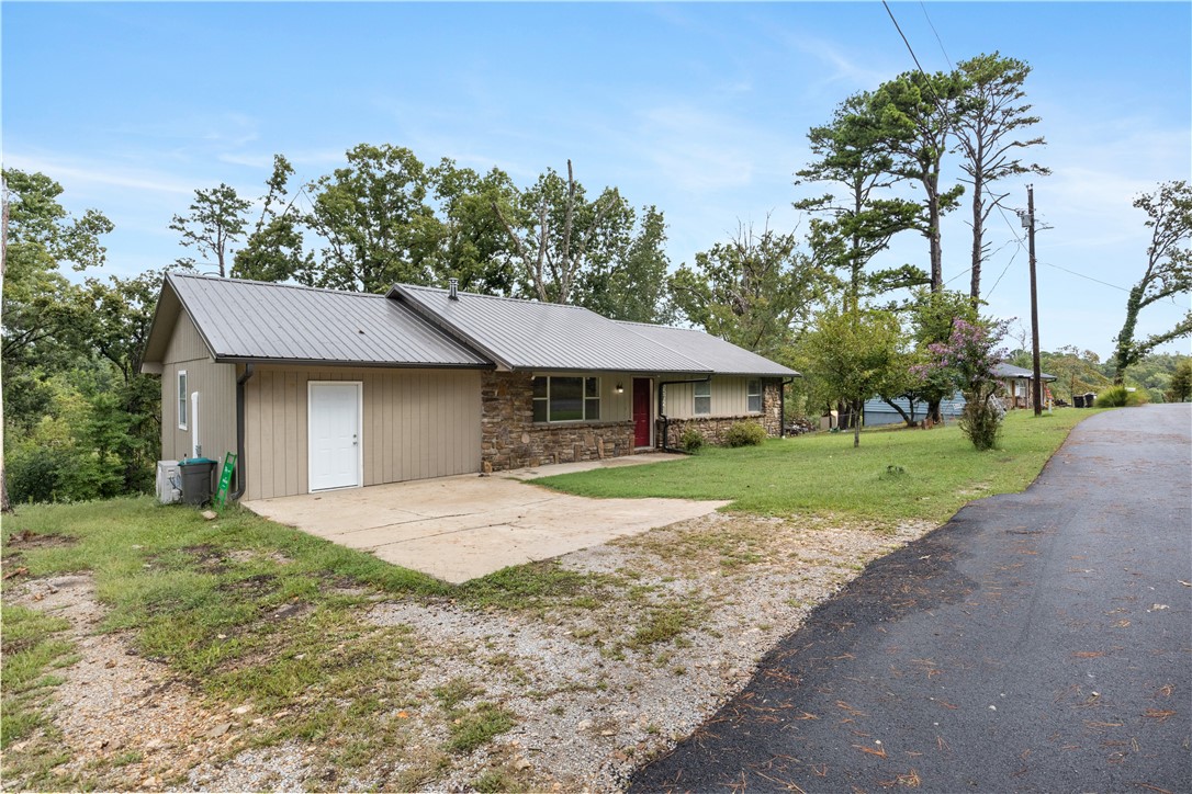 This 3-bedroom, 2 bath home is located just steps from the lake, offering stunning scenery and endless potential. With a little TLC, this property can easily be transformed into the perfect weekend retreat, vacation rental, or full-time residence. The spacious layout provides flexibility for updating and customizing to your taste, while the serene lake setting makes it a rare find. Whether you’re looking for a personal getaway or an investment project, this home is a great opportunity to secure a property in a highly desirable location near the water.