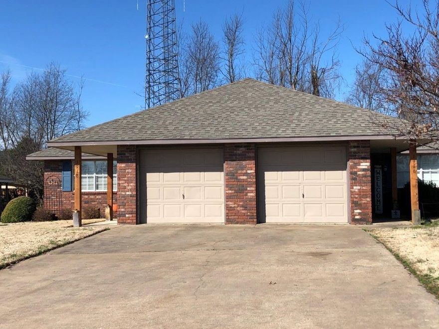 Owner occupied brick duplex in excellent condition. Large windows in living area with open kitchen. 2 bedroom / 2 bath each side with nice yard & garage.